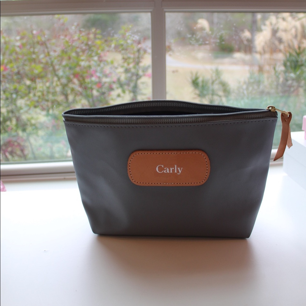 Never used Jon Hart grande toiletry bag.